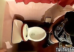 Lustful guy beating off in a toilet