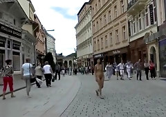 Pretty NIP Activity girl Nichola walks nude through town