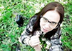 A spontaneous outdoor oral sex in the park. Whilst walking throughout the park, nerdy Vicky in her plaid shirt and cute glasses suddenly pulls him int