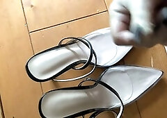 Two streams of jizz on hot high heels