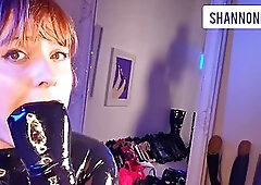 Amateur girl in latex catsuit licks heels and gloves on cam