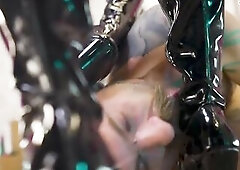 A tattooed dude, trembling with anticipation, kneels in advance of 2 dom honeys in taut latex. One dominant-bitch grasps his hair to look up at her as