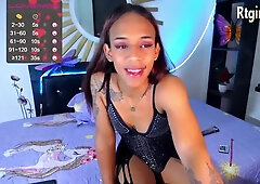 thin teen latina tgirl with full tattoos smoking on webcam