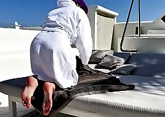 I slipped up to the rooftop lounge, took off anything, and lay totally exposed below the cover. My fingers worked my cunt whilst my other hand pinched