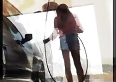 In my Daisy Dukes at the car wash