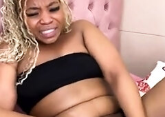 Dorothy Black and Britney use the toy