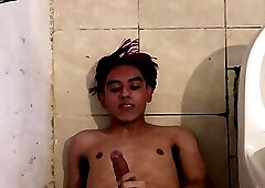 Purple-haired latino twink eating his own cum