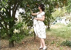 Older woman gets a younger woman bare outside and fingers her twat. Sextoy in lez outdoor action.