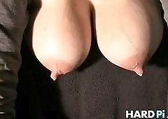 Babe plays with her lactating big tits