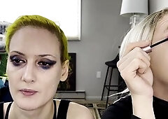 Dude and girl getting glam with mascara and fake lashes