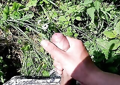 I went out to jerk off in a field by the road.Pretty cum with a worthy cock