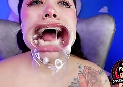 Inked Babe in Ring Gag Drools on Huge Dildo