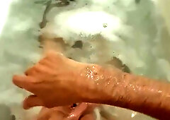 Draining in the Tub in Bathing Suit