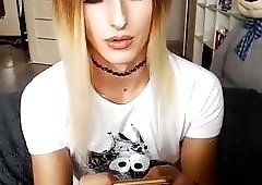 Shemale cutie loses her clothes and strokes her big cock