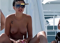 Young nudist showing her perfect natural juggs