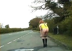 Transgender In Yellow Dress On The Road