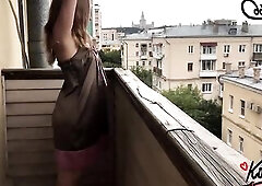 Hot teen with tiny breasts is getting banged on the balcony, in the centre of the day