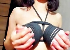 Pleasing brunette hair binds her large titties!