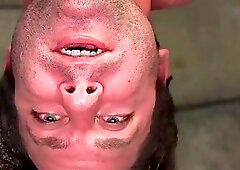 Gorgeous tranny nurse in leather bangs a restrained patient's ass