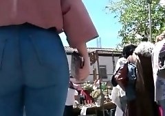 Street voyeur follows a sensuous amateur girl in tight jeans