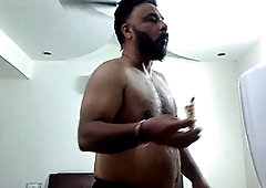 Steamy Indian daddy Austin Rose getting dressed in snug underwear after a shower