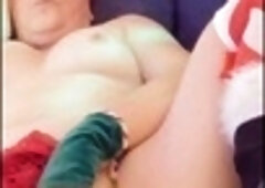 Curvaceous hotwife Steffi plays Santa's sexy helper in a naughty two pussy dance!