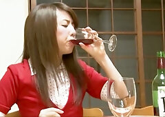 Voluptuous brunette enjoys wine before intimate bedroom moment with her lover