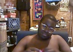 Plump black guy wanking his rod