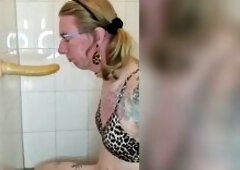 Sissy sucks sex toy