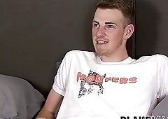 Twink strips during an interview and strokes his big schlong