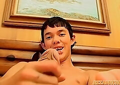 Pierced slim twink Riley Wiggins strokes his throbbing cock