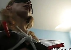 Busty babe gets aroused while enduring pain on her titties