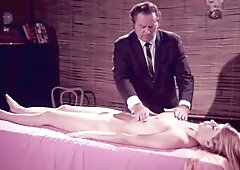 Two nude women indulge in a hairy vintage lesbian encounter on a furry white rug