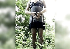Trans crossdresser outdoors ejaculation in underware, pants and nylons.