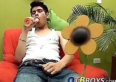 Horny twink Samuel sucking on a dildo and jerking off