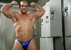 Hot Blonde Bodybuilder Oiling Himself Up In The Locker Room