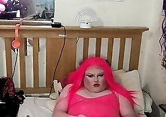 pink latex girly plays with her girly cock