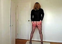 Black leather dress and fishnet pantyhose strip