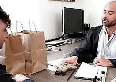 Handsome oiled BJ hunk in sexy thongs sucks cock in office