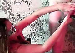 Domme Spanks Balls And Cock Of Naked male slave