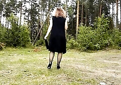 walking in the woods in hose with heels