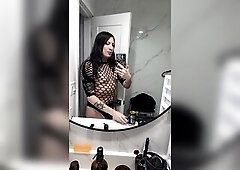 Fishnets wench showing off