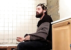 Bearded gay guy films himself jerking off after doing construction