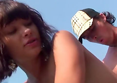 Completly natural lady is being shared by two horny dudes