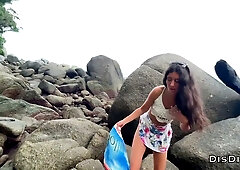 Russian brunette caught with bikini bottom down on a rocky public shore