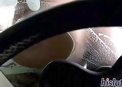 Lataya and Ricki wash a car