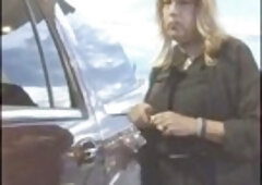 Gassing up in mini-dress