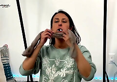 Bound brunette explores sock and tape bondage in a private session