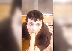 Trans woman on floor sucks sextoy