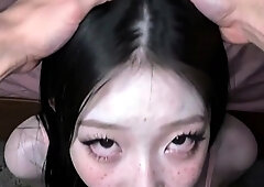 Girl with long black hair kneels for deepthroat on bedroom
